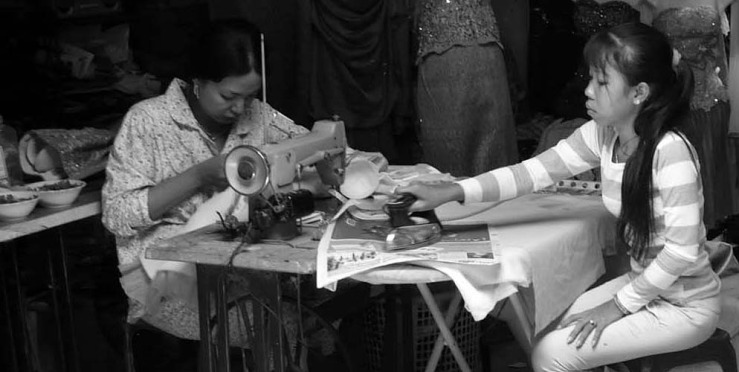 bw two women sew iron.jpg