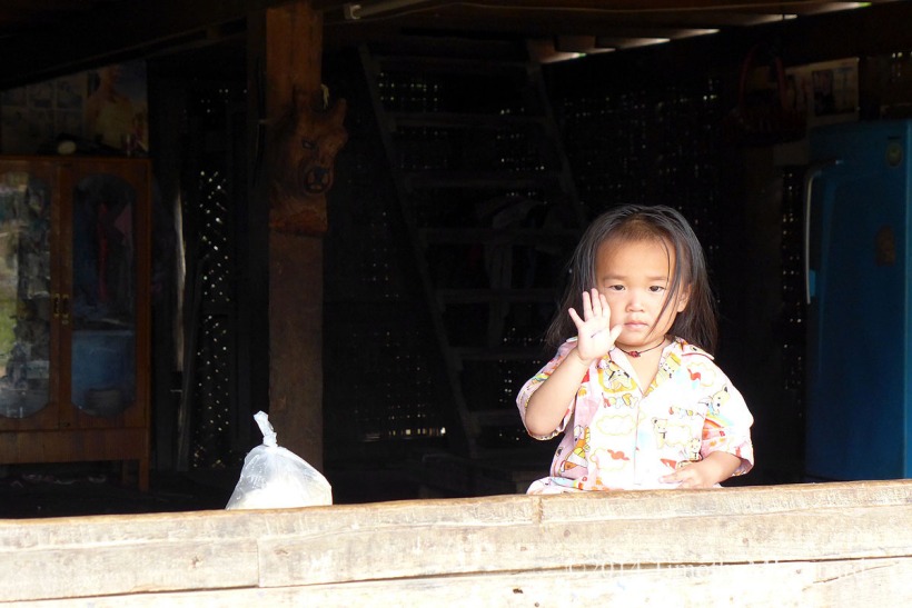 laos hand girl village .jpg