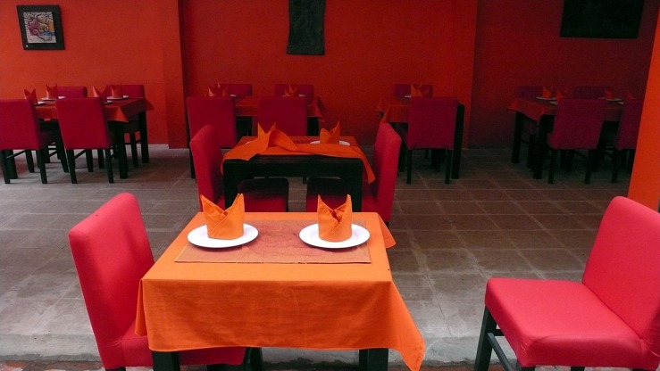 orange tables white plates.jpg