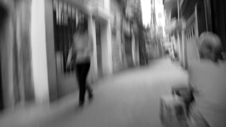out of focus wide alley people.jpg