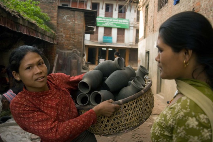 woman with basket pottery.jpg