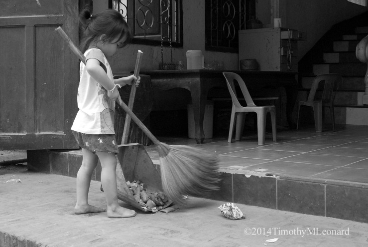 young girl sweeps.jpg