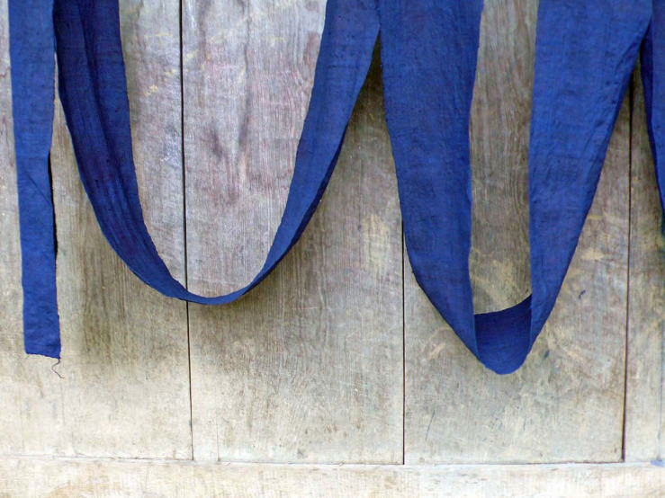 blue indigo dries on wood.jpg