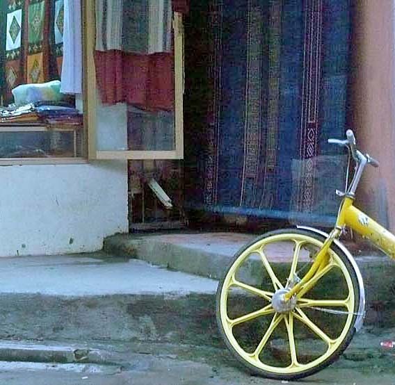 cropped yellow bike wheel.jpg