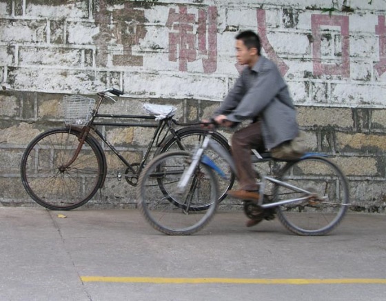 man on bike past bike.jpg