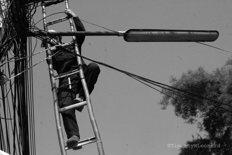 phone man ladder.jpg