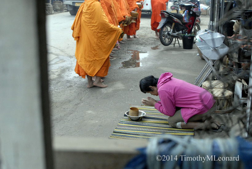 woman pray monks.jpg